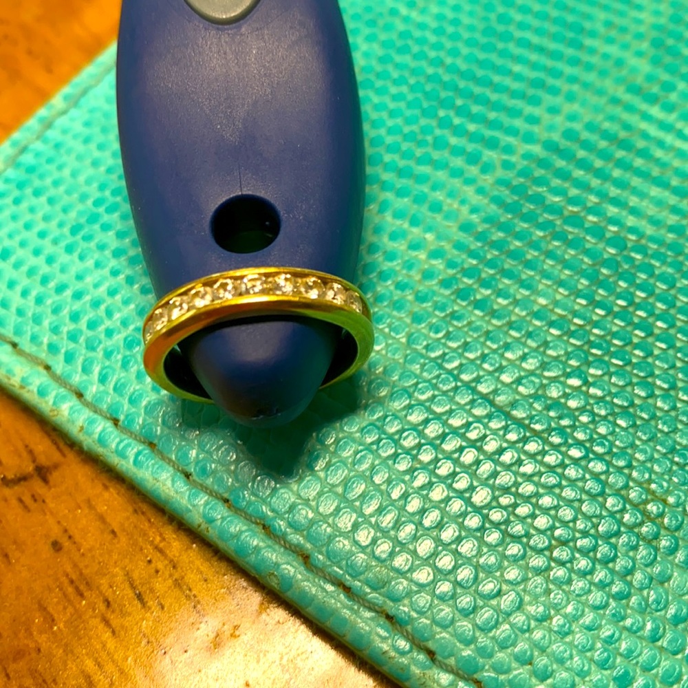 Beautiful 18K Gold ring with diamonds on top.